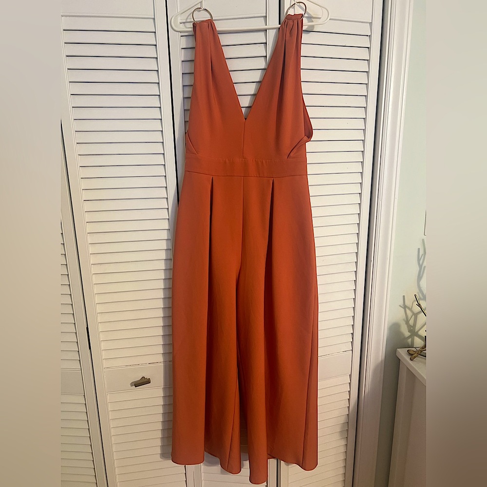 Orange V-neck Jumpsuit with Gold Accents